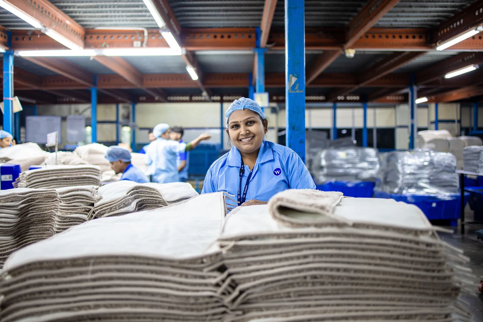 Employees working in a manufacturing environment