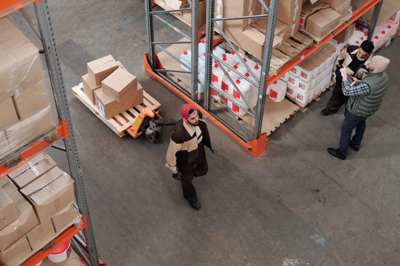 Warehouse employees working together